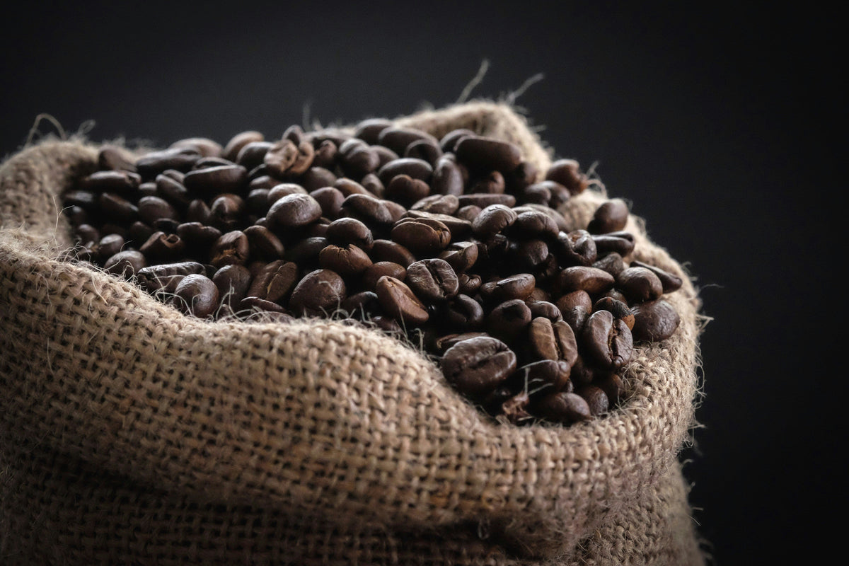 Burlap sack of roasted coffee beans